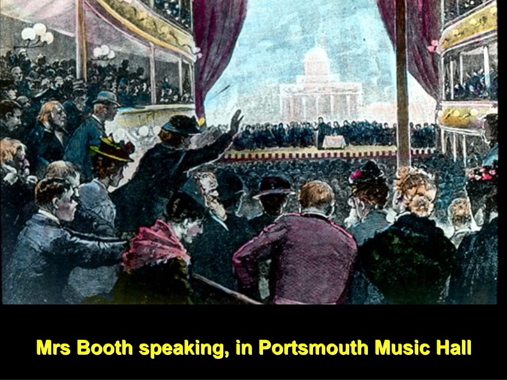 Mrs Booth speaking, in Portsmouth Music Hall.